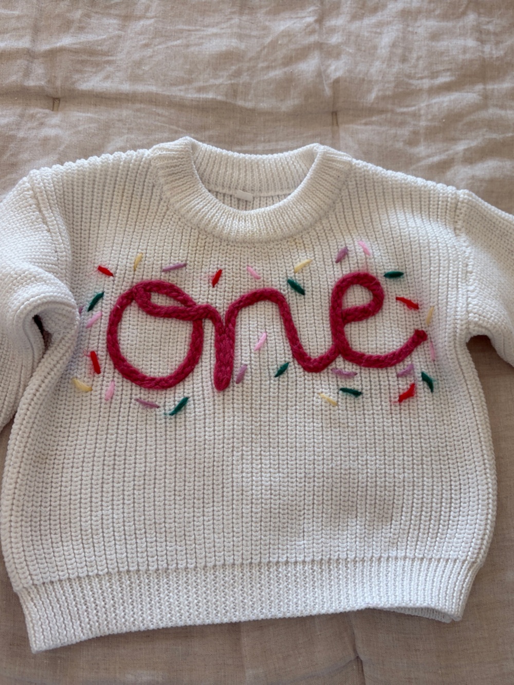White Baby Girl Sweater with Pink 'One' Embroidery